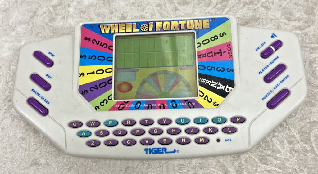 Tiger Wheel Of Fortune Vintage Electronic Handheld Game with Cartridge WORKING Main Image